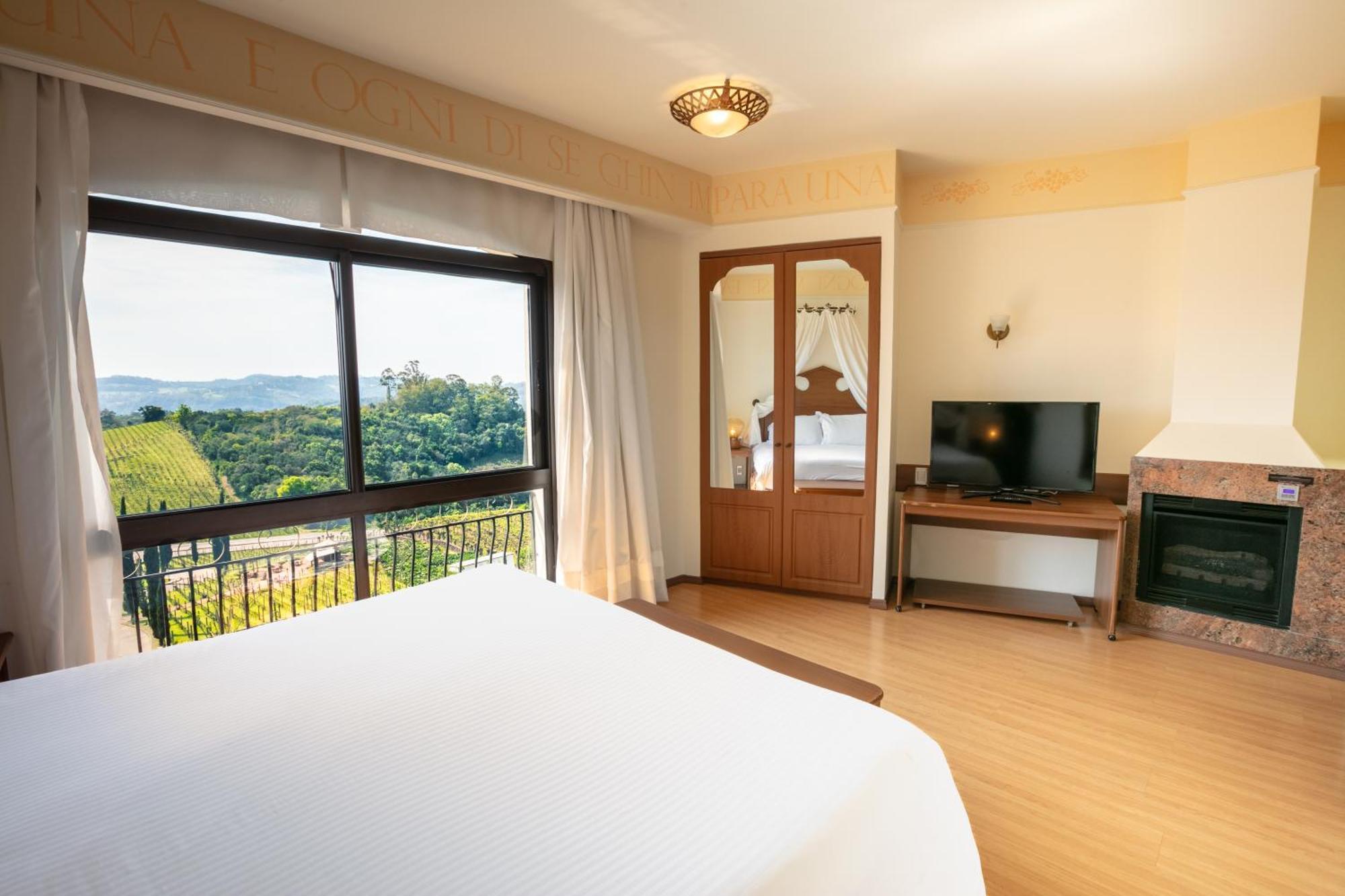 Spa Do Vinho Condominio Vitivinicola Bento Gonçalves Exterior foto A bedroom at the hotel